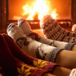 warming socks by fire